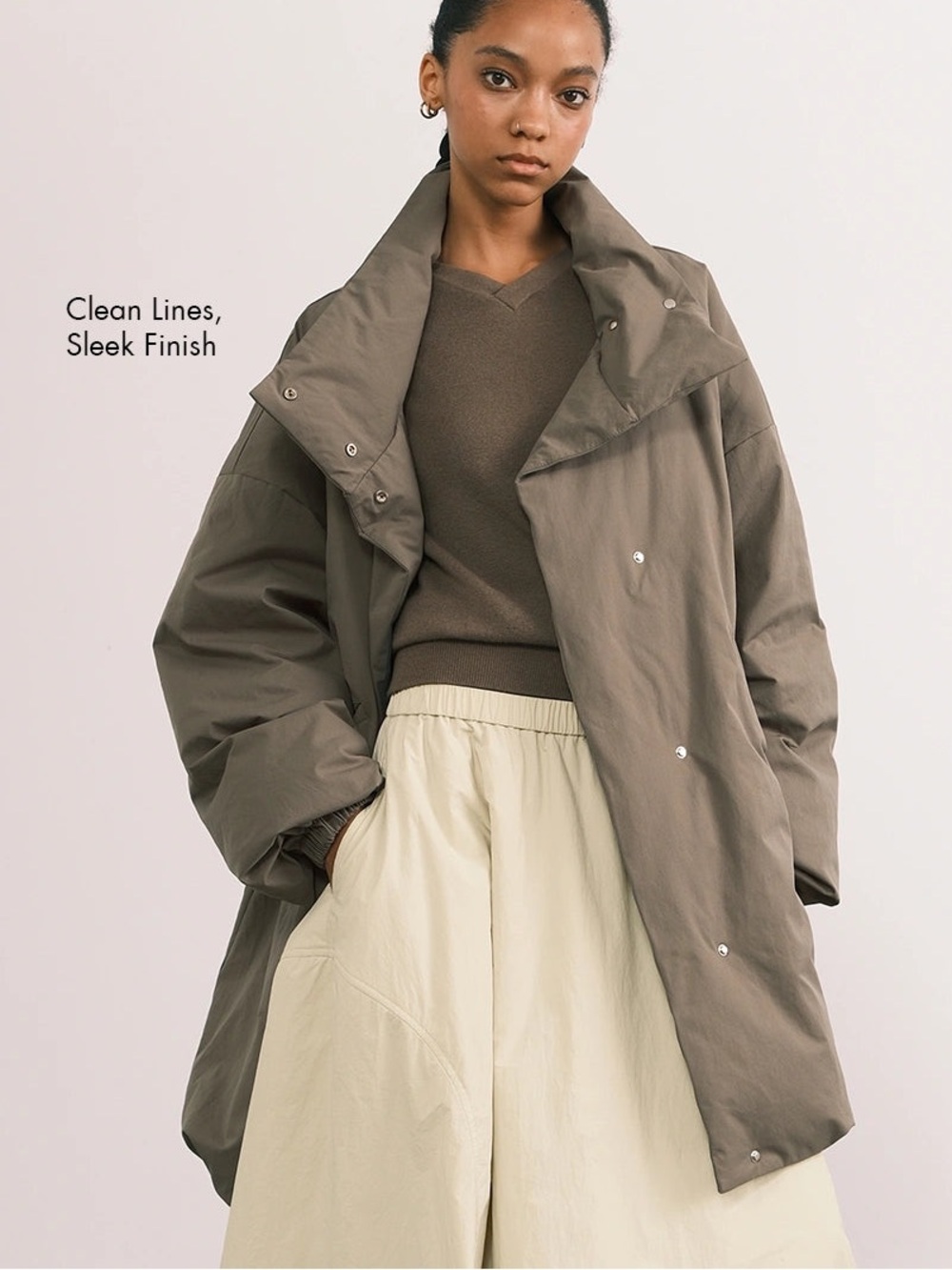 An Action Day Longline High-Neck Down Lightweight Puffer Coat